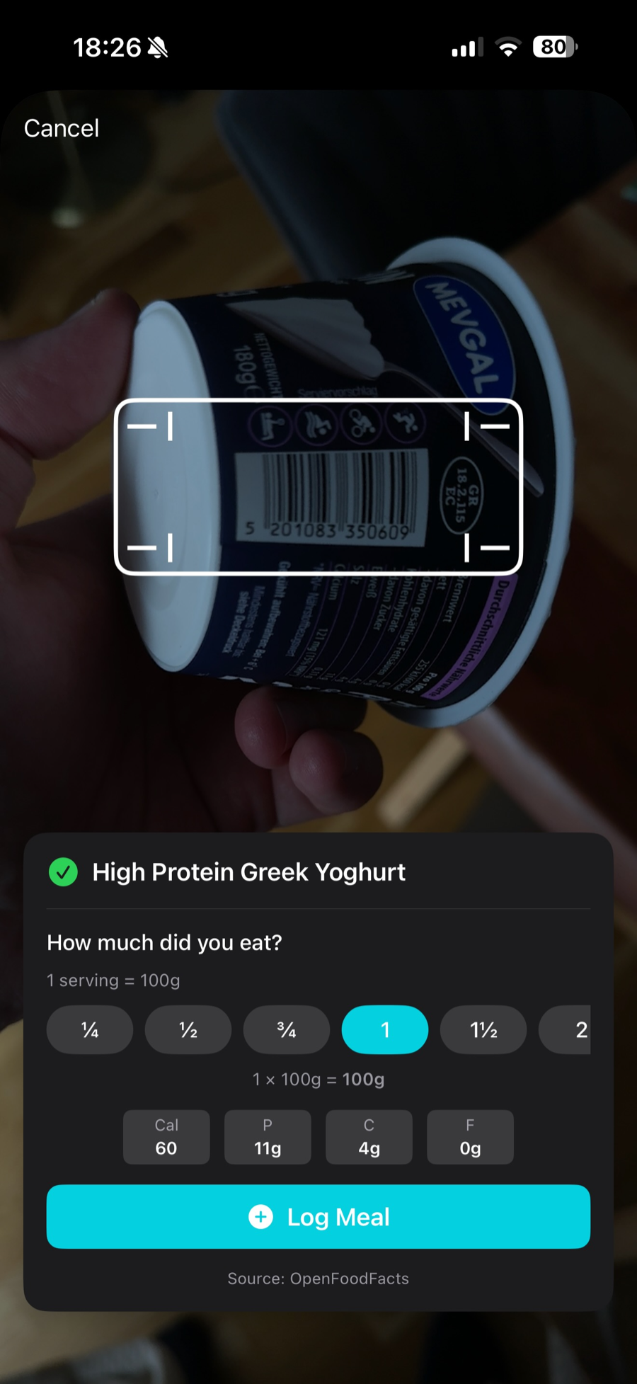 Scanning a yogurt-cup barcode in the app, with a nutrition card surfacing showing calories, protein, carbs, and fat per serving.